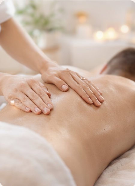 Hands massaging the back of a guest